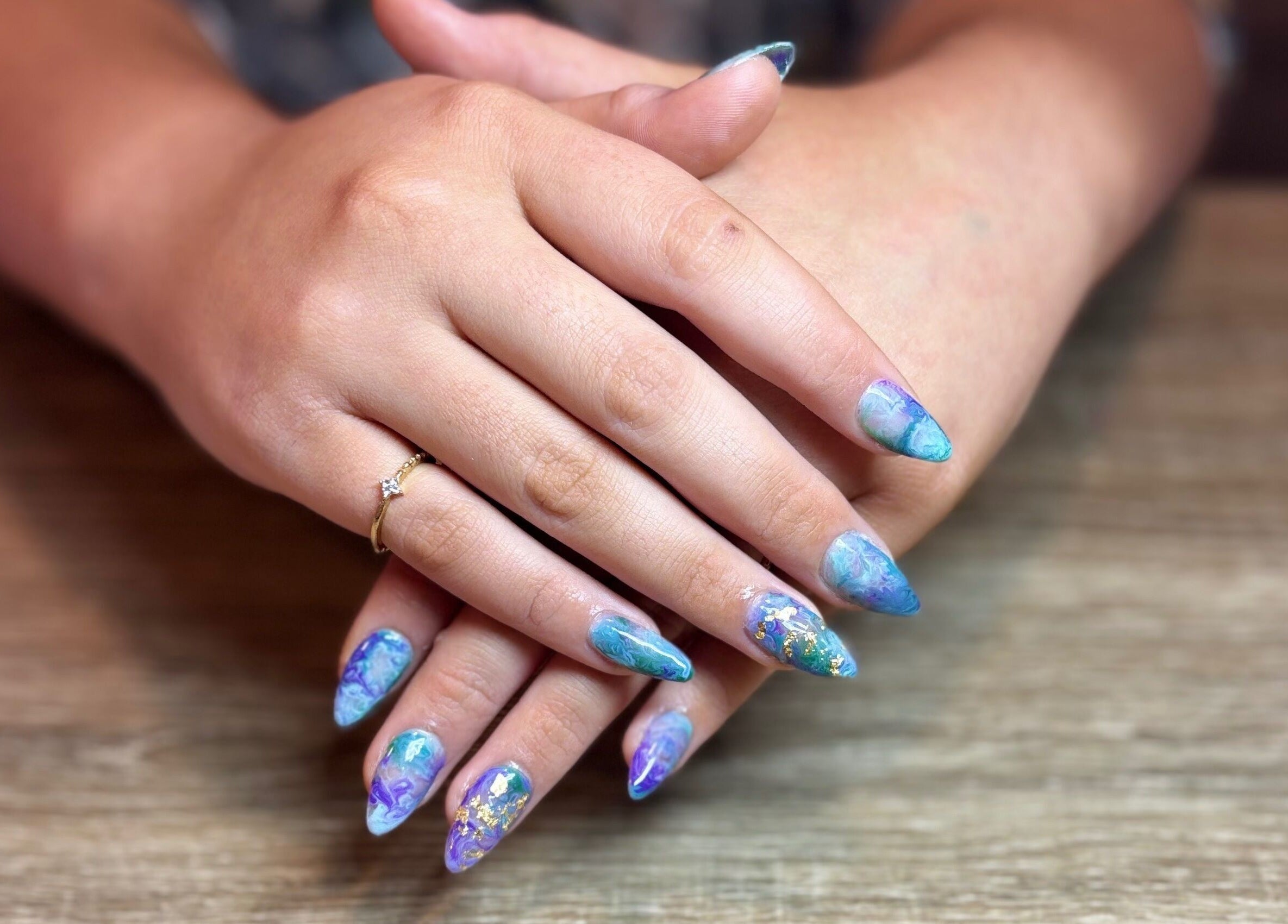 Beautifully designed nails at Executive Elegance, Dunedin, Otago, NZ showcasing vibrant and artistic nail art.