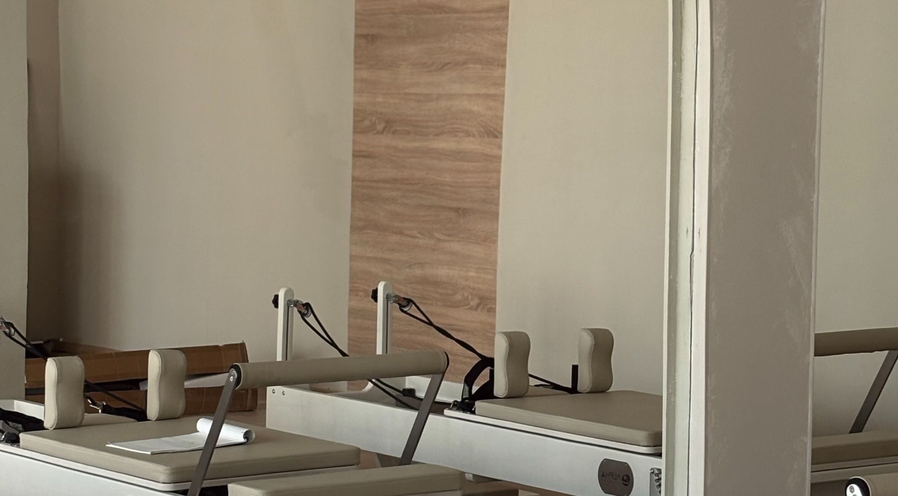 Pilates reformer machines in Aurora Pilates Studio, Strovolos, Lefkosia, CY, offering modern workout space.