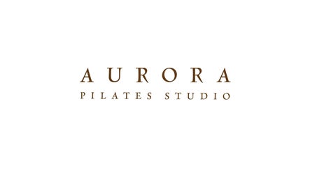 Aurora Pilates Studio logo in Strovolos, Lefkosia, CY, featuring elegant brown typography.