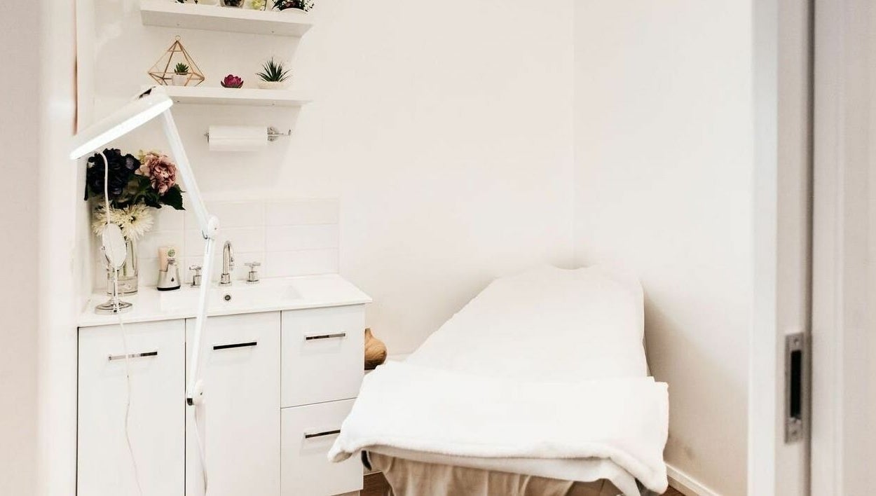 Relaxing treatment room at Beauty Brow and Lash Bar, Prahran, Victoria, AU with spa bed and elegant decor.