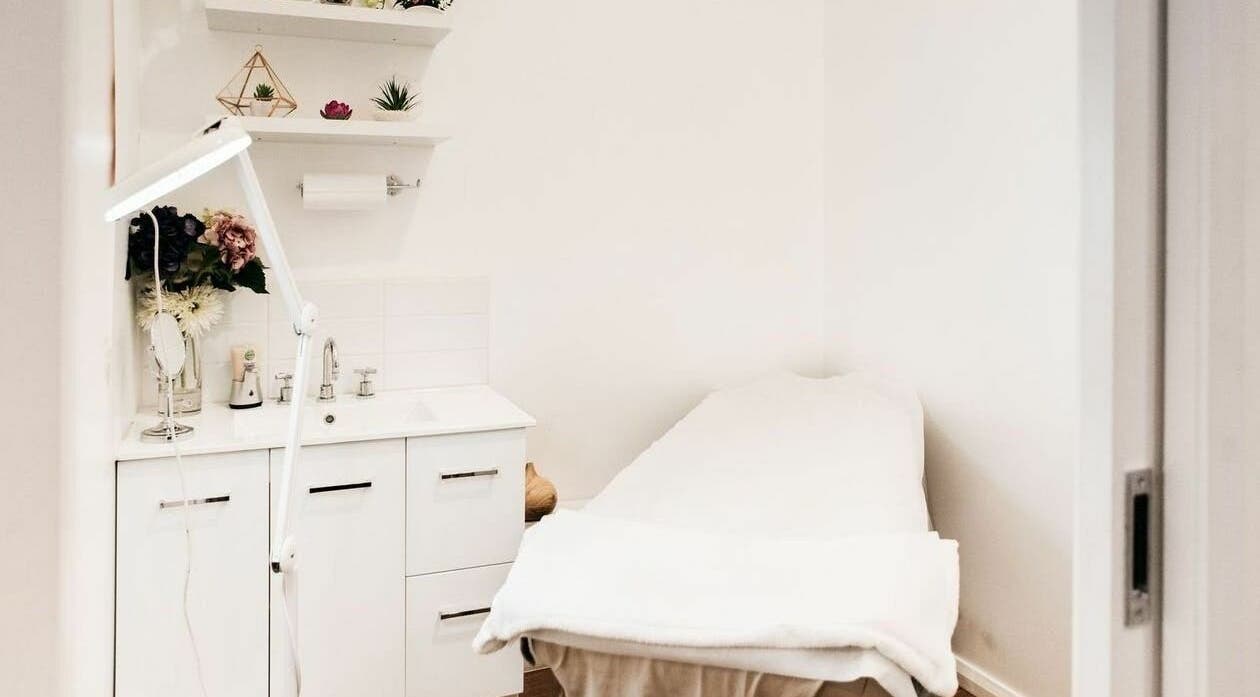 Relaxing treatment room at Beauty Brow and Lash Bar, Prahran, Victoria, AU with spa bed and elegant decor.