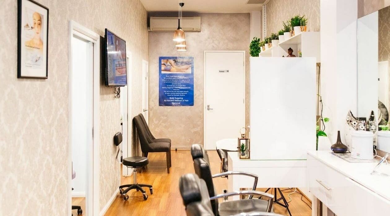 Chic interior of Beauty Brow and Lash Bar in Prahran, Victoria featuring stylish seating and modern decor.