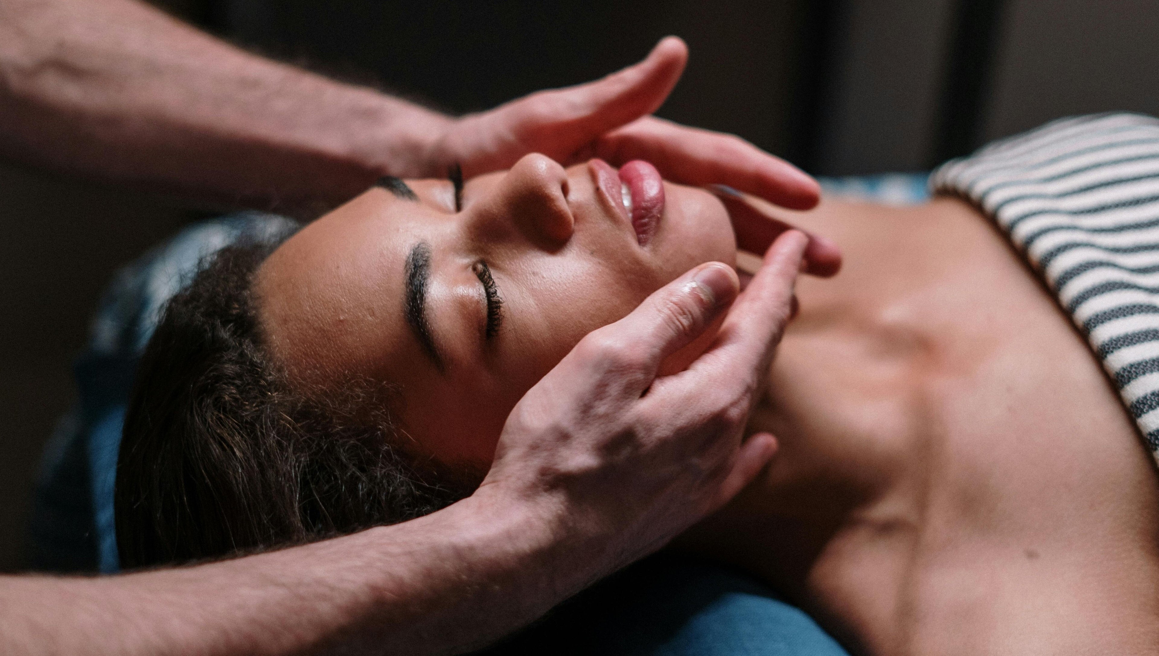 Guest receives soothing facial massage at Sereno Spa, Livingston Manor, New York, US.