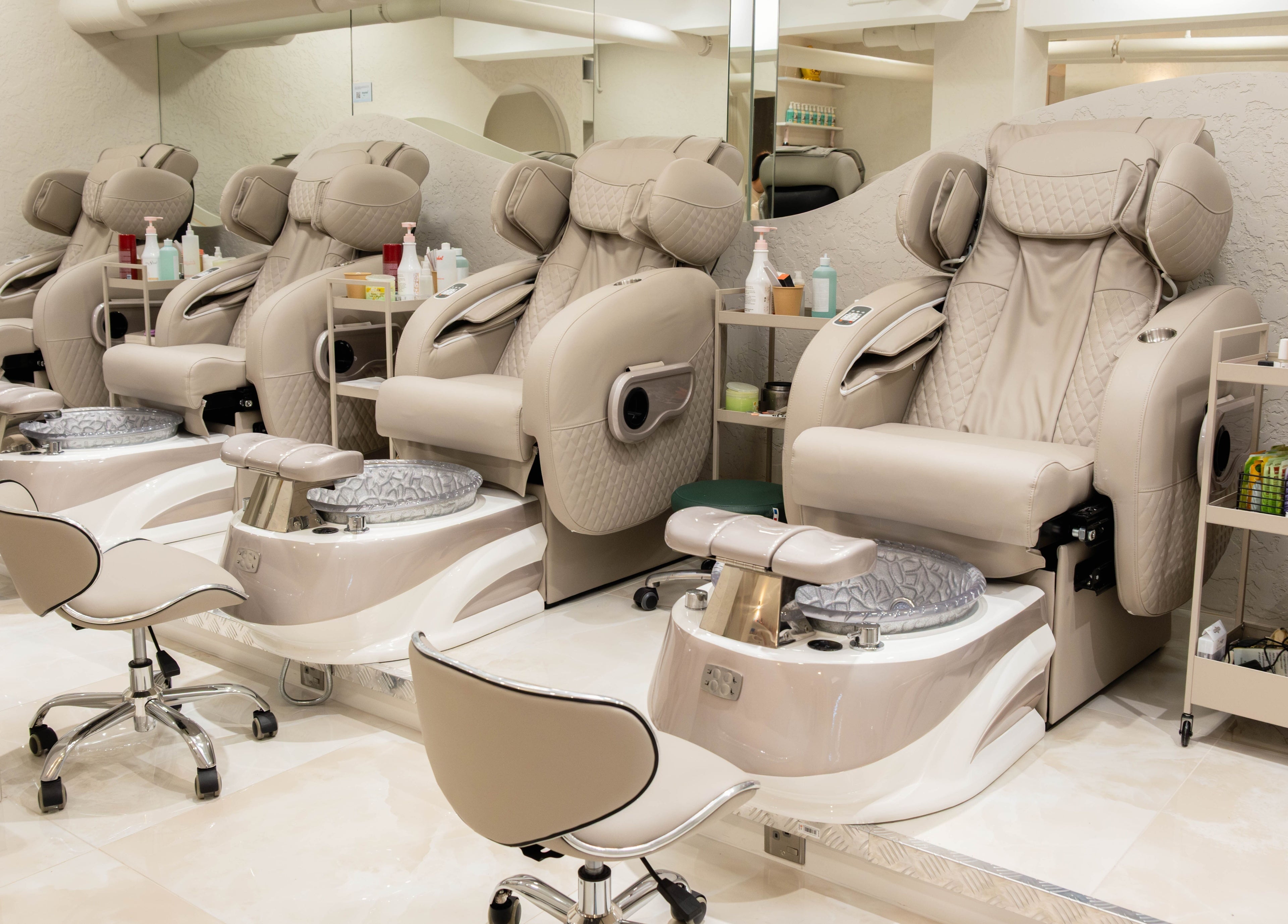 Luxurious pedicure chairs at Keo Spa, London, England, GB, offering a tranquil beauty experience.