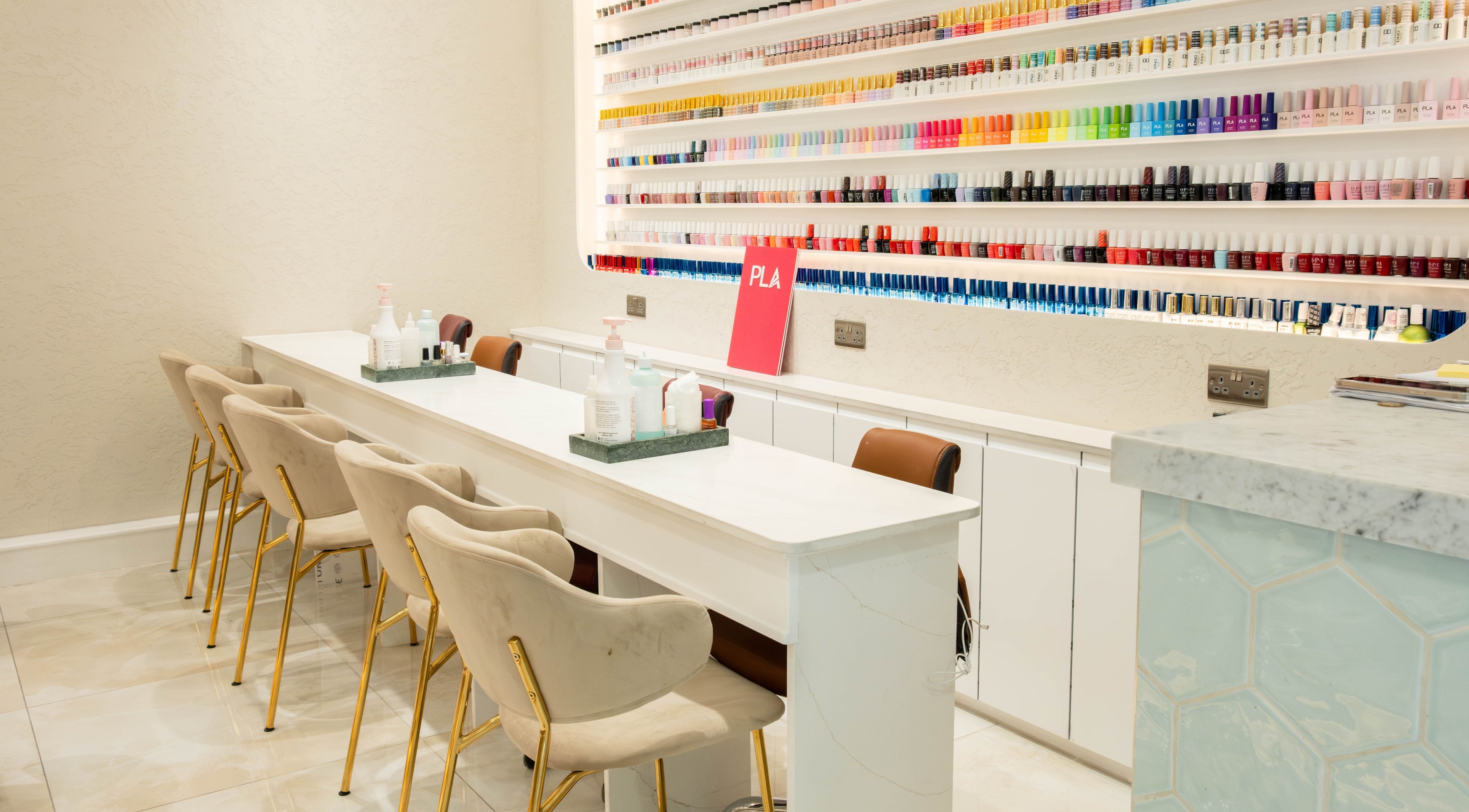 Elegant nail bar with vibrant polish options at Keo Spa, London, England, GB.