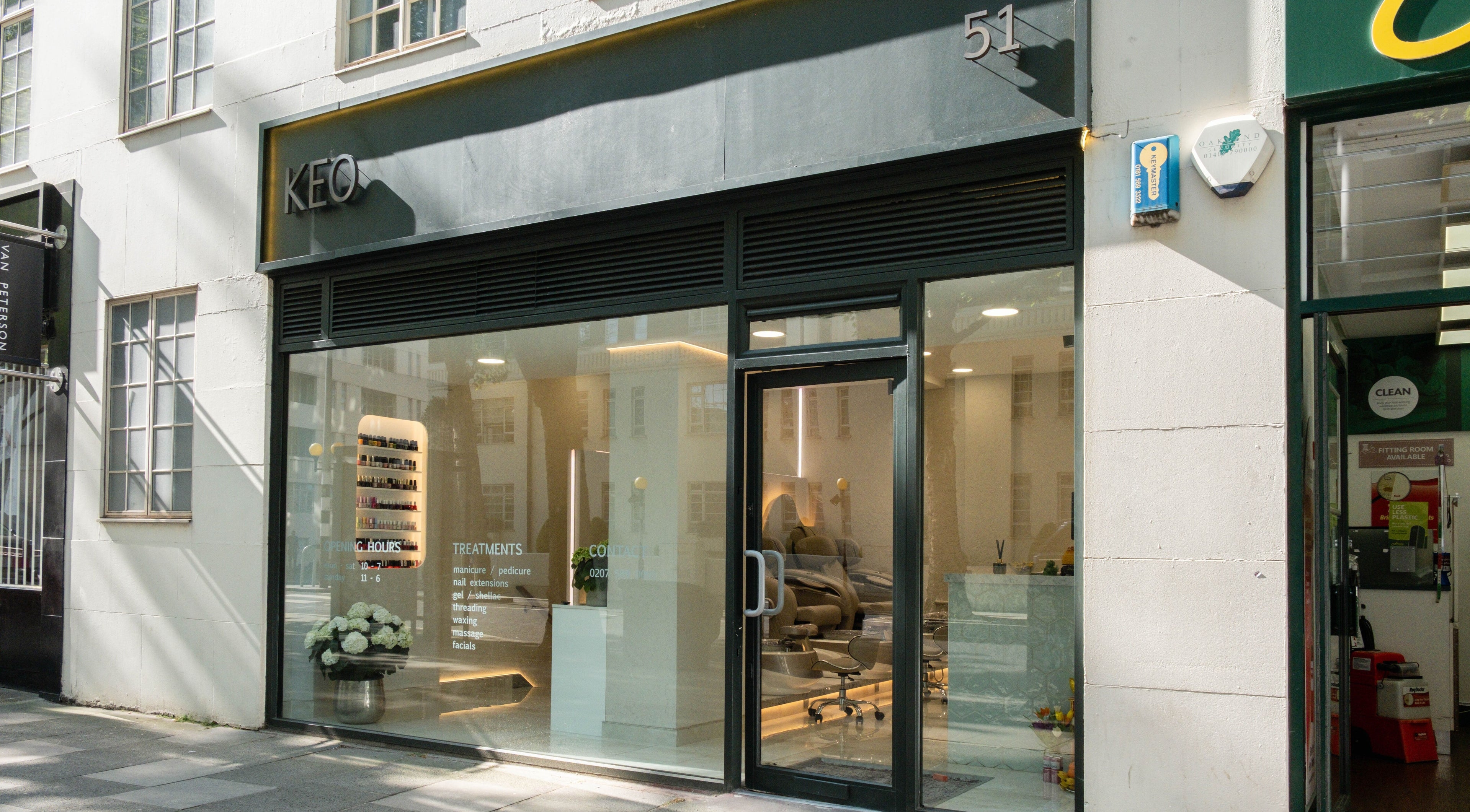Exterior view of Keo Spa, London, England, GB, featuring stylish glass entry and modern signage.