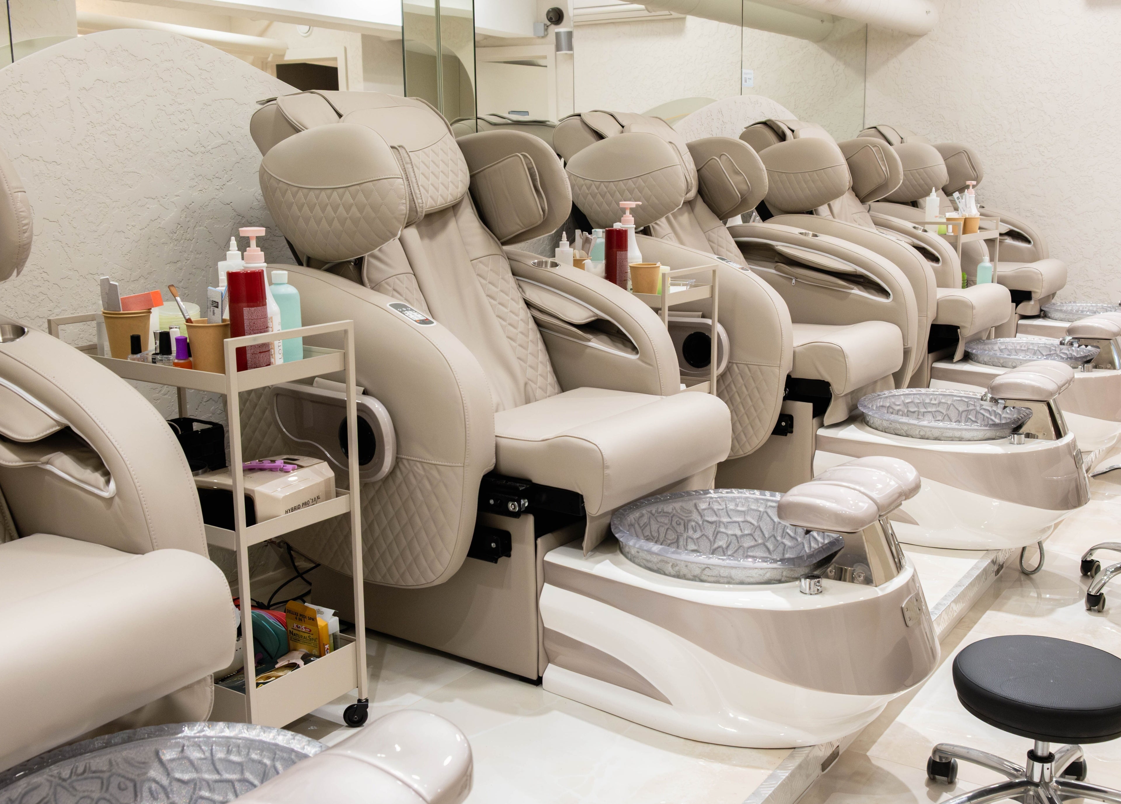 Luxurious pedicure chairs at Keo Spa, London, England, GB, offering comfort and relaxation.