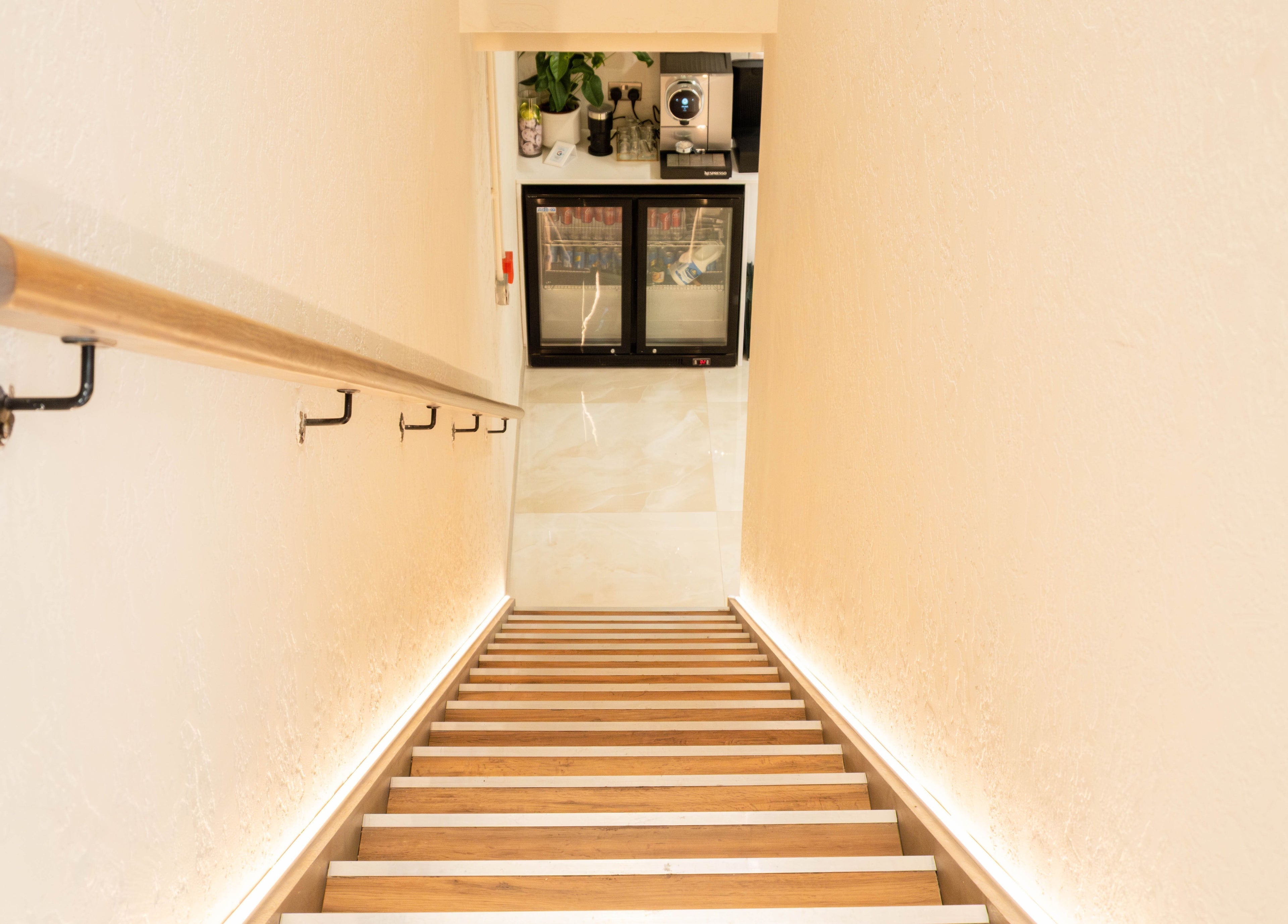 Staircase leading to relaxation area at Keo Spa, London, England, GB.