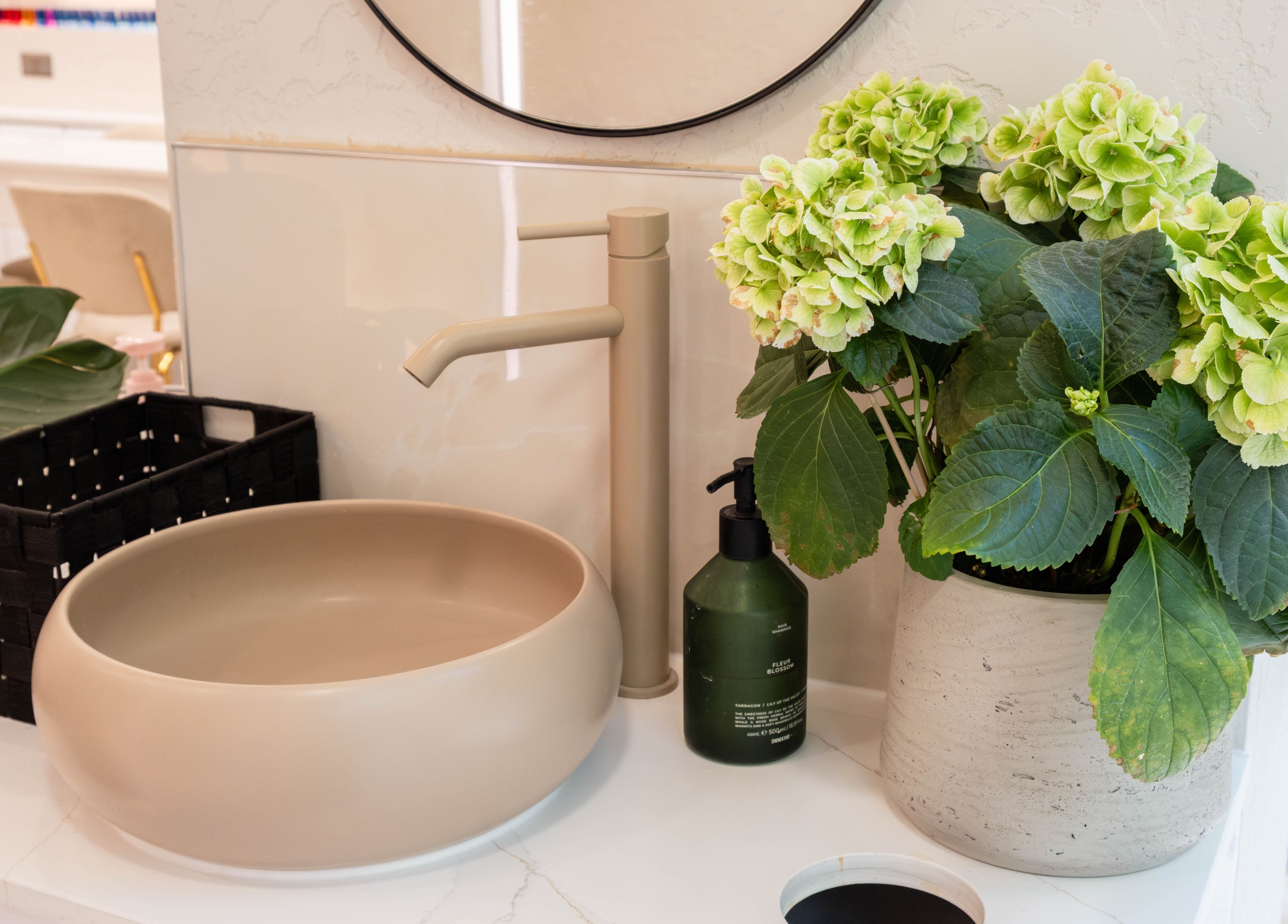 Elegant sink with lush plants at Keo Spa, London, England, GB enhancing a tranquil ambiance.