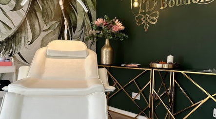 Elegant treatment chair at Lash & Brow Opulence, Bournemouth, England, GB. Beautiful decor enhancing the serene ambiance.