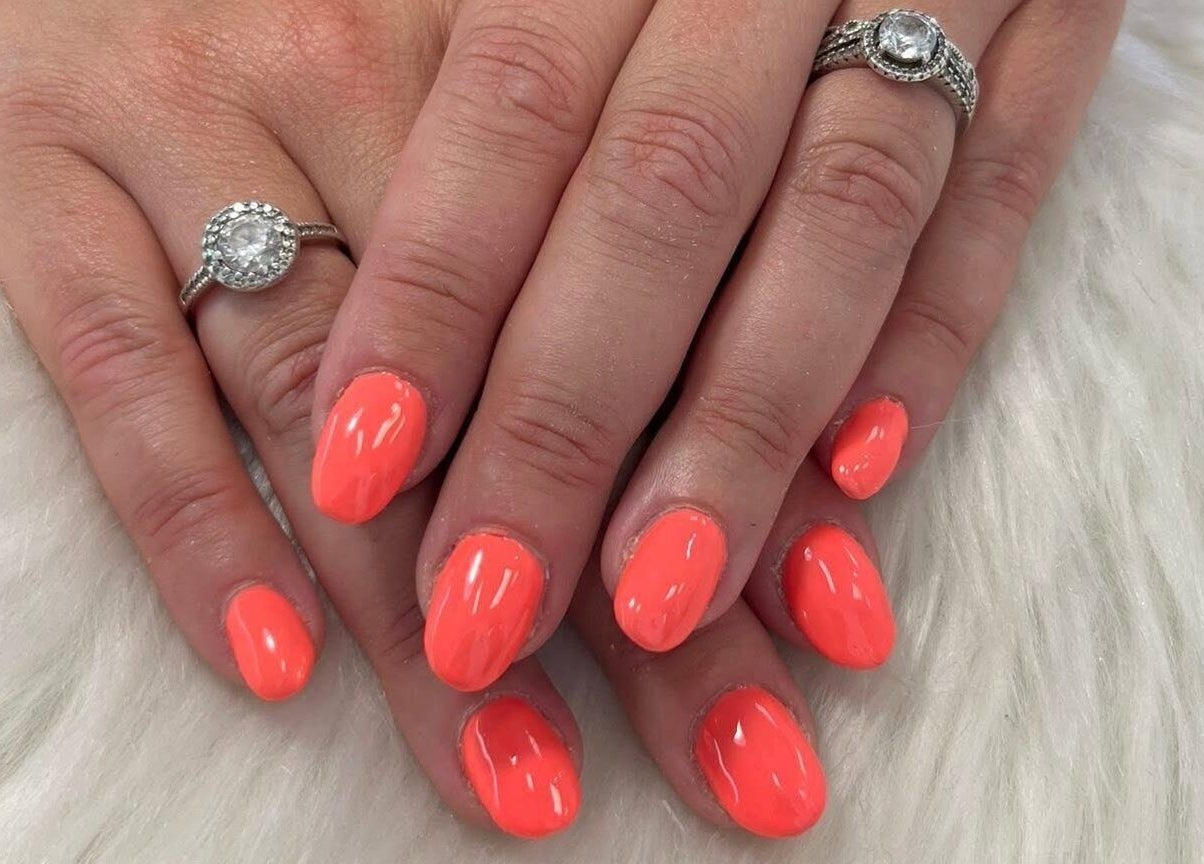 Vibrant neon nails at Coco Beauty, Redruth, England, GB, showcasing expert manicure service.