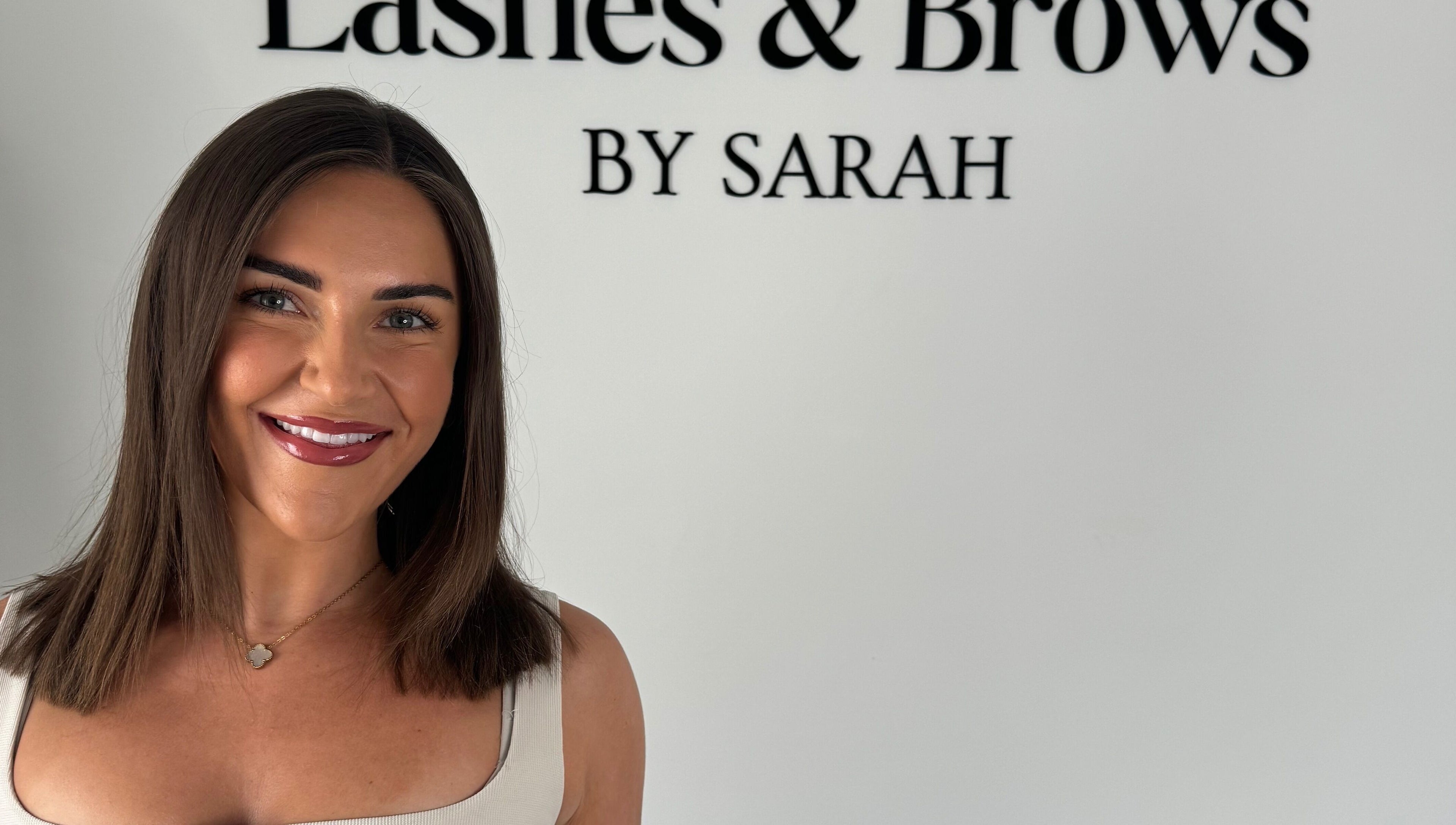 Smiling woman at Lashes & Brows by Sarah, Southend-on-sea, England, GB.