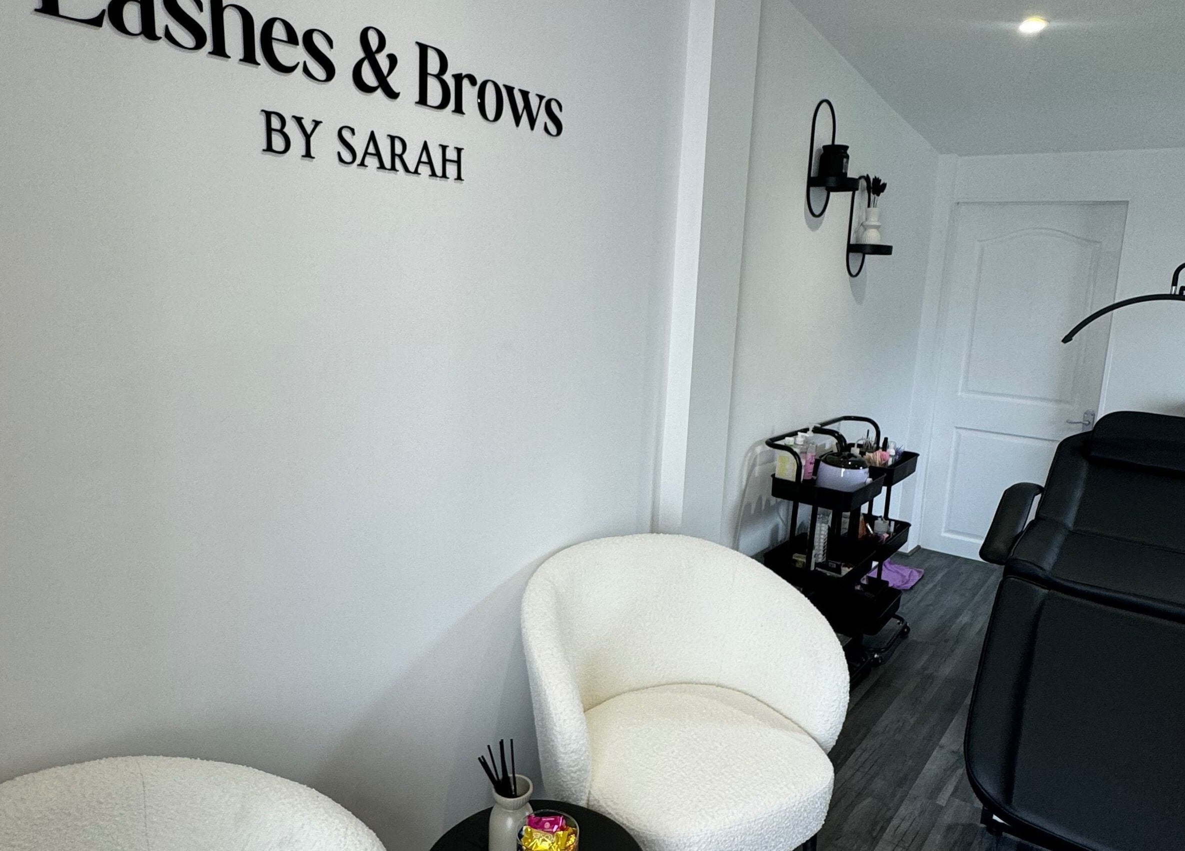 Relaxing interior of Lashes & Brows by Sarah in Southend-on-sea, England, GB with cozy chairs and treatment bed.