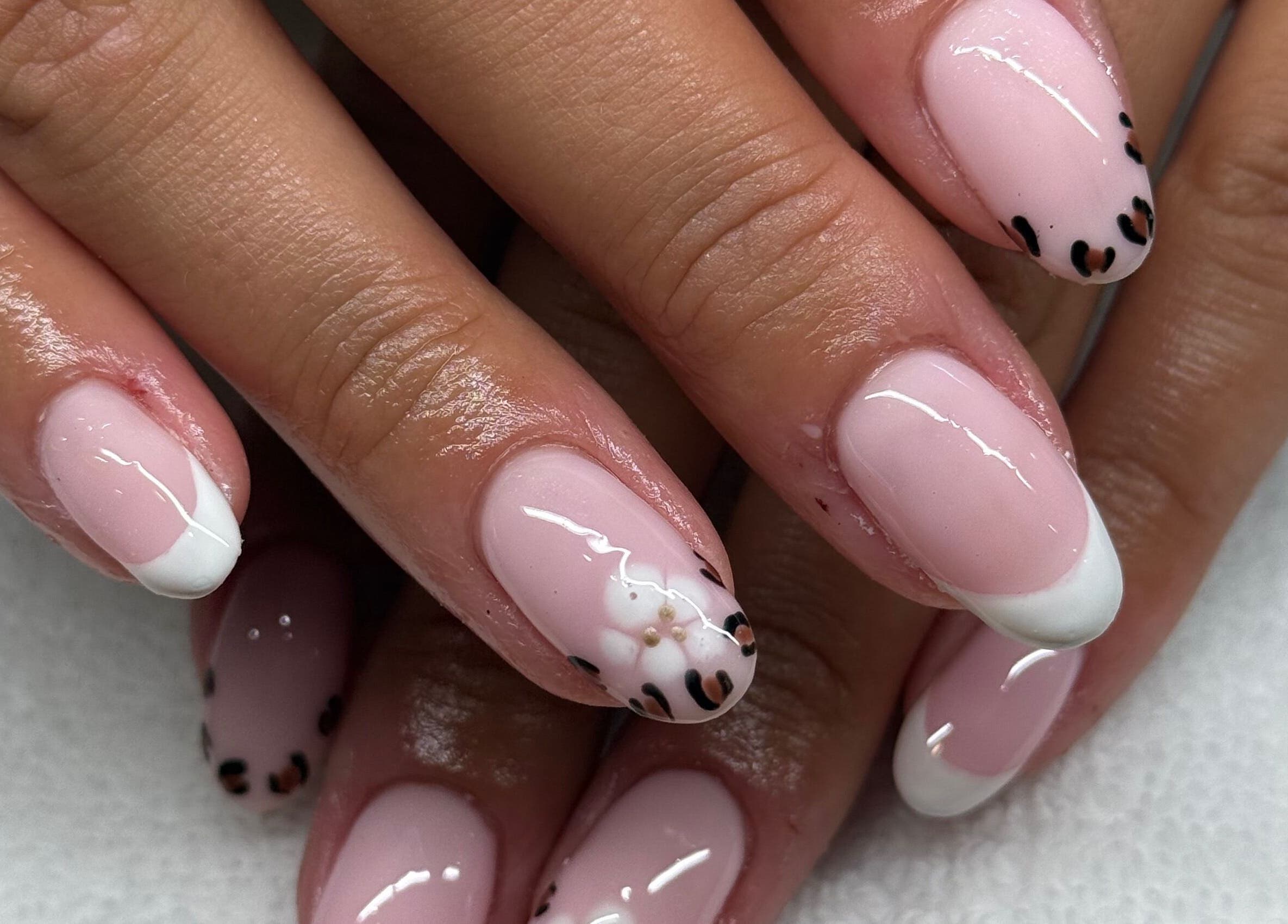 Elegant nail art showcasing pink and white designs at Lavish Touch Dundee, Dundee, Scotland, GB.