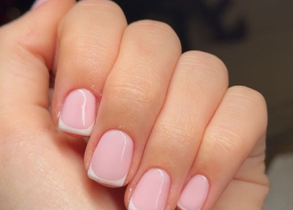 Close-up of French manicure at Lavish Touch Dundee, Dundee, Scotland, GB. Perfectly curated nail art.