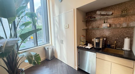 Refreshment nook with plants at Silky | The Healthy Hair Experts, New York, New York, US.