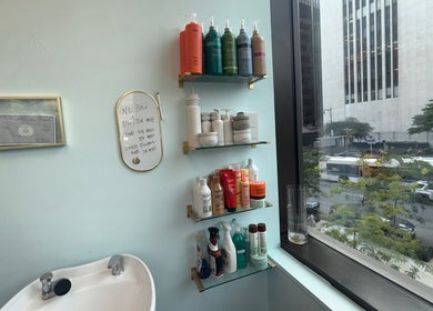 Hair products and sink at Silky | The Healthy Hair Experts, New York, New York, US.