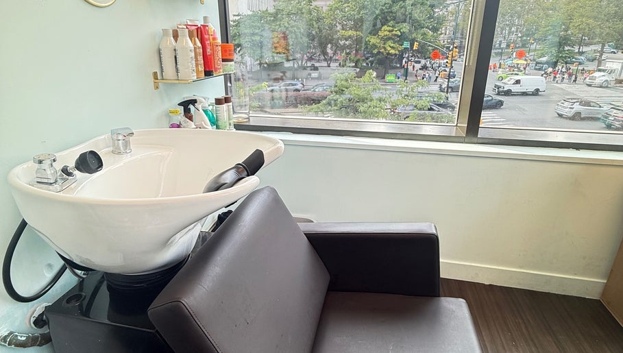Cozy wash station at Silky | The Healthy Hair Experts in New York, New York, US with a city view.