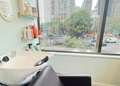 Stylish salon chair and sink at Silky | The Healthy Hair Experts, New York, New York, US.
