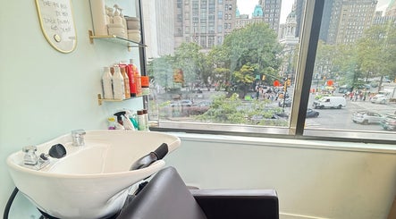 Stylish salon chair and sink at Silky | The Healthy Hair Experts, New York, New York, US.