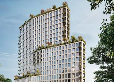 Modern building in New York, New York. Home to Silky | The Healthy Hair Experts, surrounded by lush greenery.