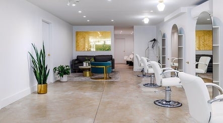 Interior of Silky | The Healthy Hair Experts 2 in Brooklyn, New York, US showcasing modern salon chairs and decor.