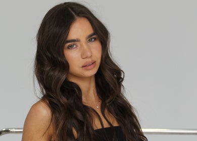Radiant brunette with wavy hair at Glow Your Way, Two Wells, South Australia, AU.