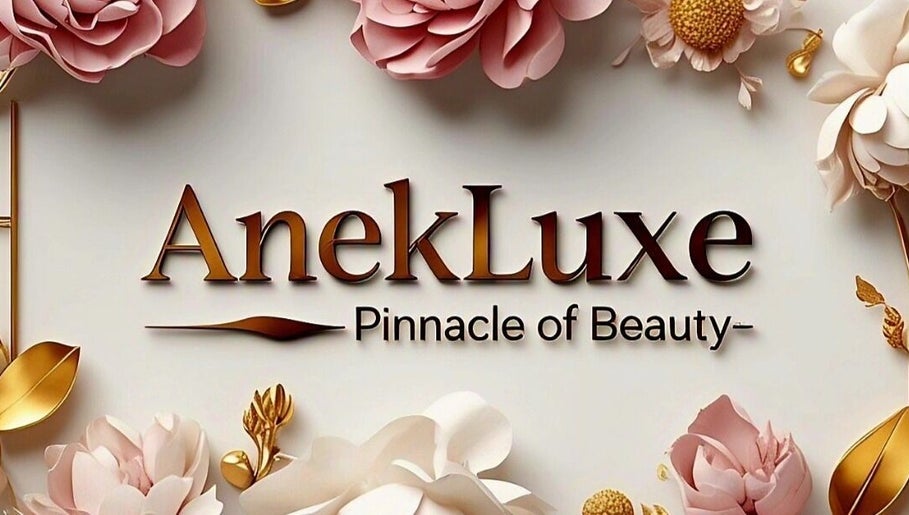 Logo of AnekLuxe Pinnacle of Beauty adorned with floral designs, located in Montego Bay, St. James Parish, JM.