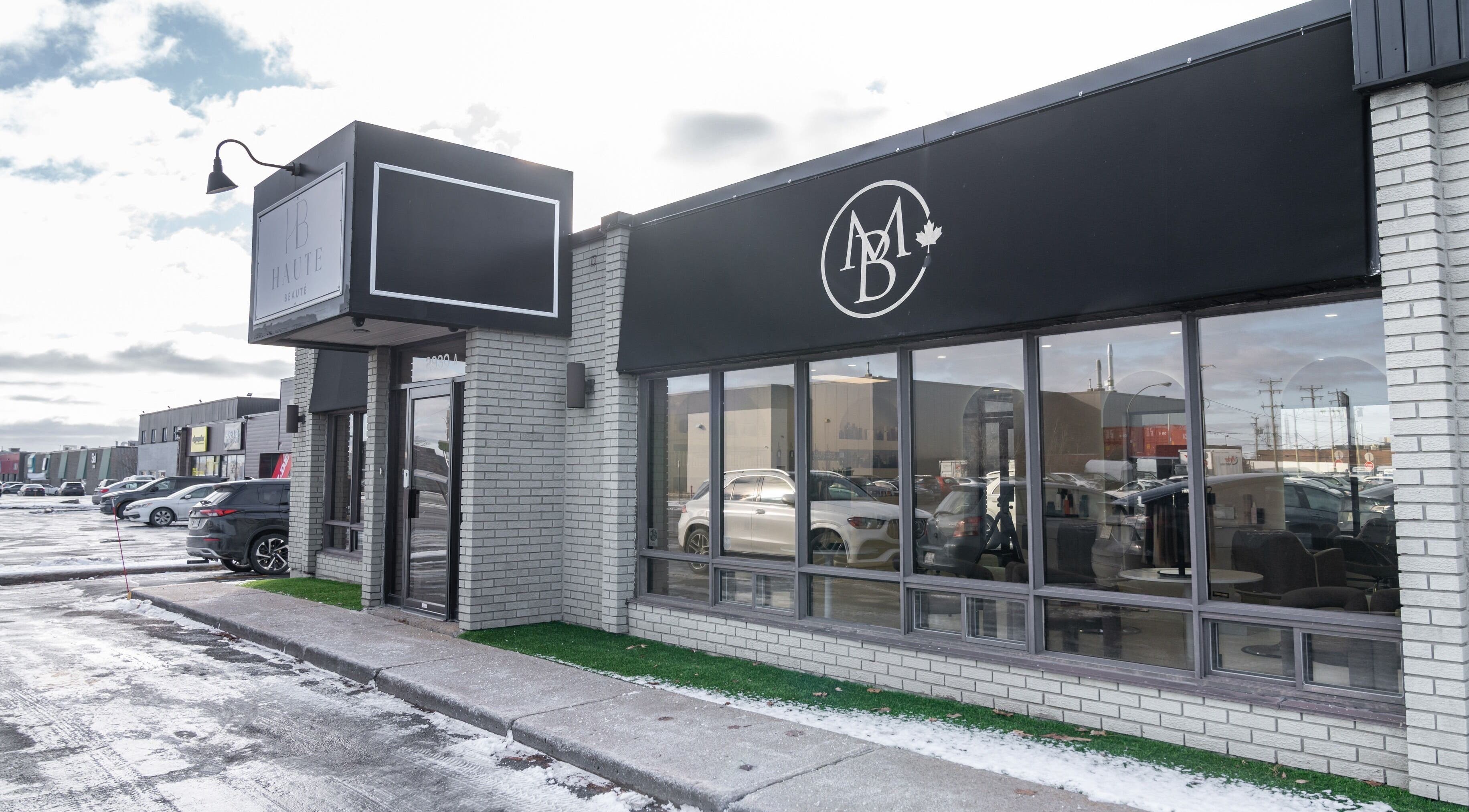 Haute Beauté exterior in Laval, Québec, CA showcasing the modern salon entrance.