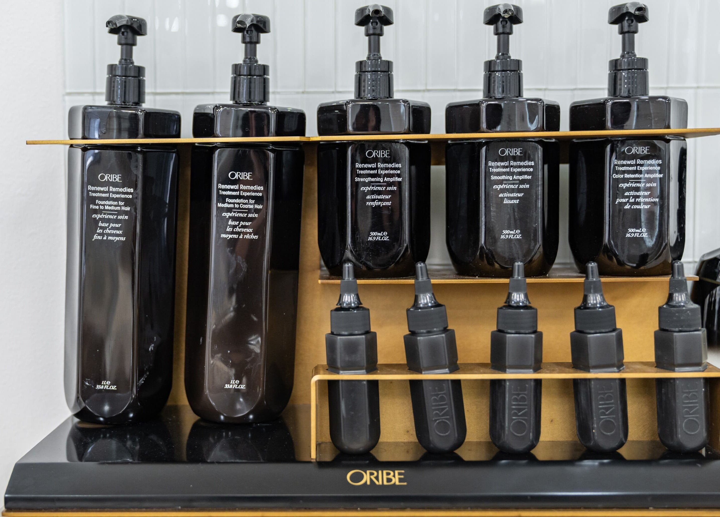 Oribe hair products on display at Haute Beauté, Laval, Québec, CA, showcasing salon's premium offerings.