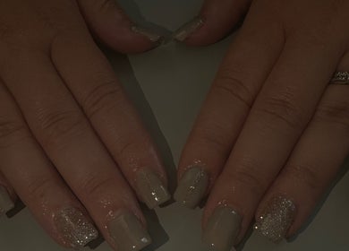 Glittering nail design by Bychloebrookesx in Edenbridge, England, GB, showcasing elegant hand artistry.