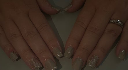 Glittering nail design by Bychloebrookesx in Edenbridge, England, GB, showcasing elegant hand artistry.