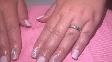 Elegant nail art with pink and silver design at Bychloebrookesx, Edenbridge, England, GB.