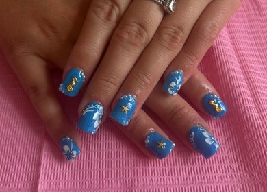 Blue ocean-themed nail art with gold accents at Beauty by Chloe🤍, Edenbridge, England, GB.