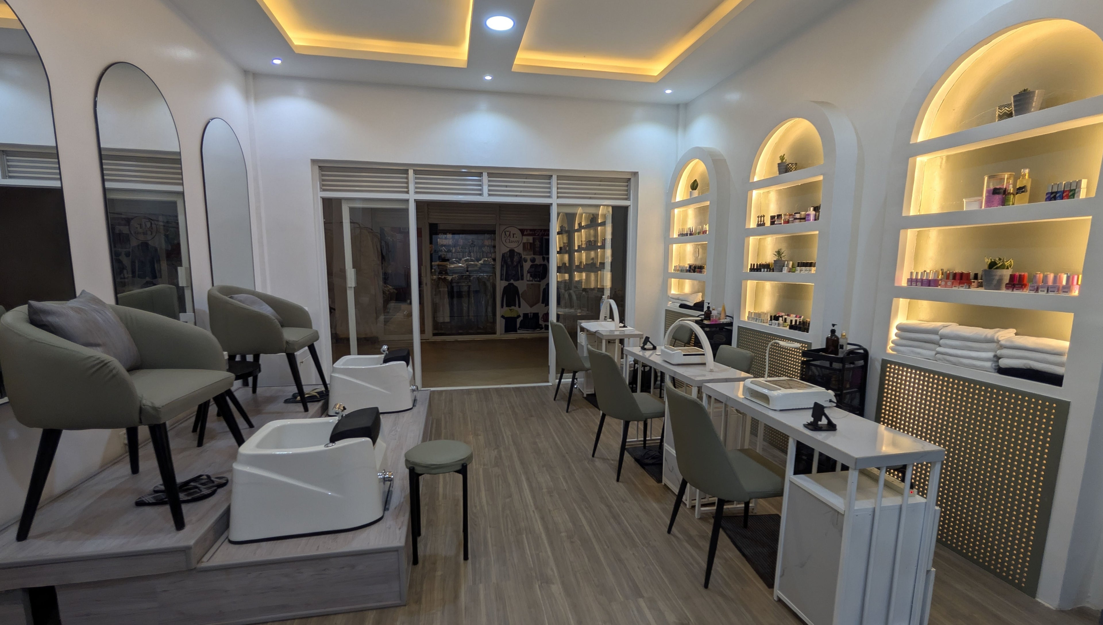 Elegant interior of Nail Tech - Bugolobi in Kampala, Central Region, UG, featuring stylish nail stations and cozy seating.