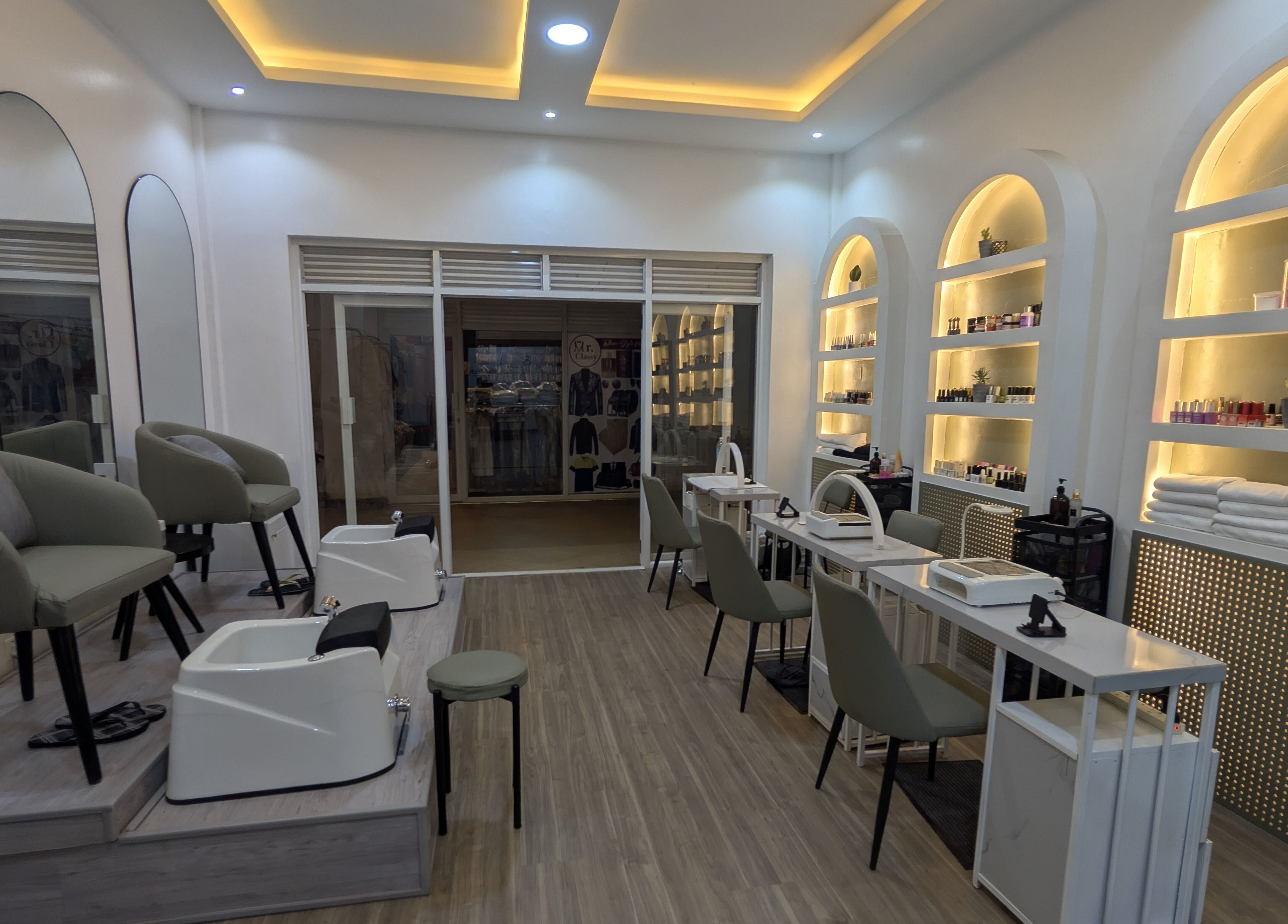 Elegant interior of Nail Tech - Bugolobi in Kampala, Central Region, UG, featuring stylish nail stations and cozy seating.
