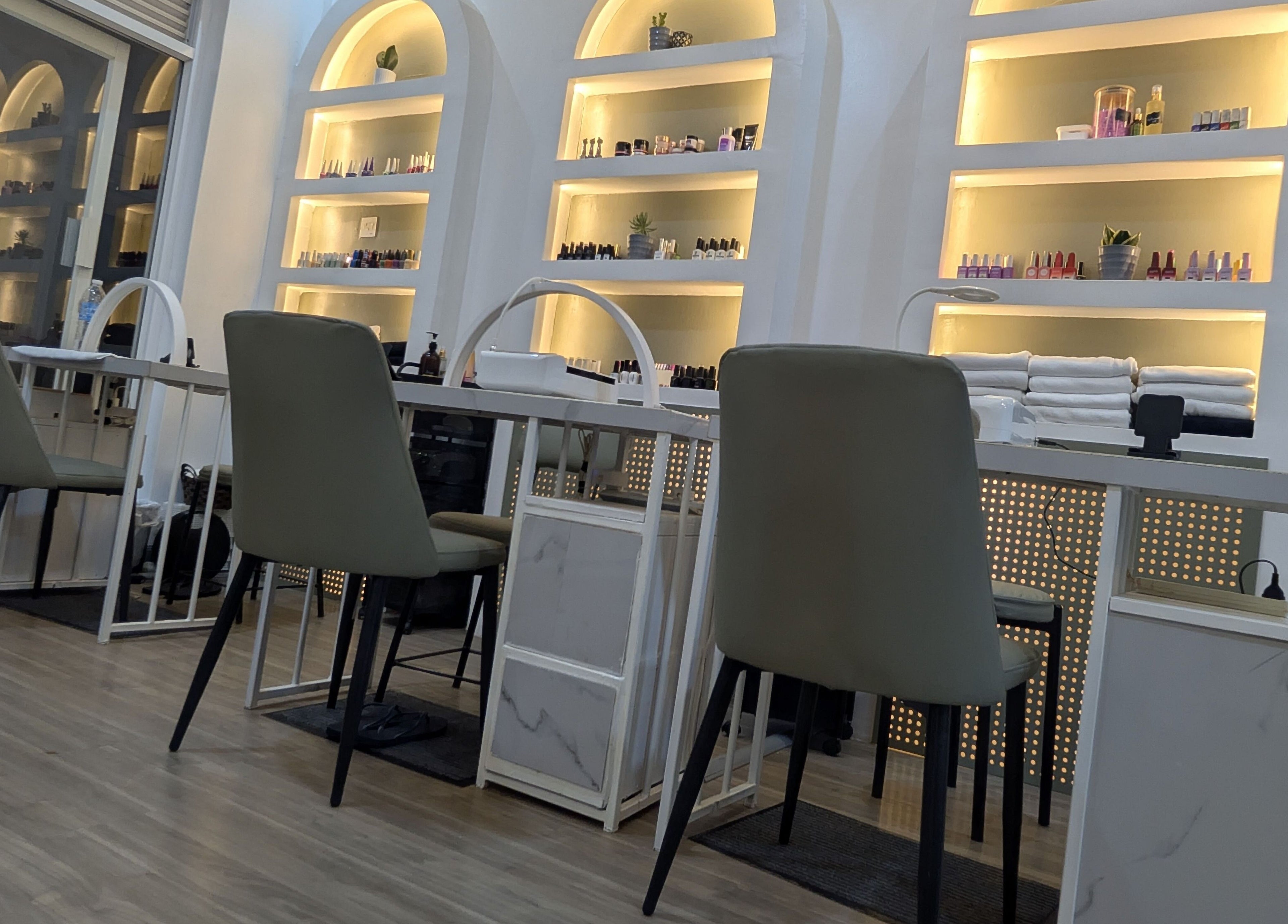 Elegant nail salon setup at Nail Tech - Bugolobi, Kampala, Central Region, UG with stylish decor and seating.