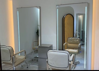 Chic and modern salon chairs with mirrors at Mès Maison, Singapore, SG, exuding luxury and style.