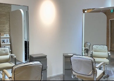Stylish salon chairs at Mès Maison, a beauty venue in Singapore, Singapore, SG offering premium wellness experiences.