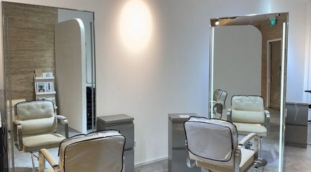 Stylish salon chairs at Mès Maison, a beauty venue in Singapore, Singapore, SG offering premium wellness experiences.