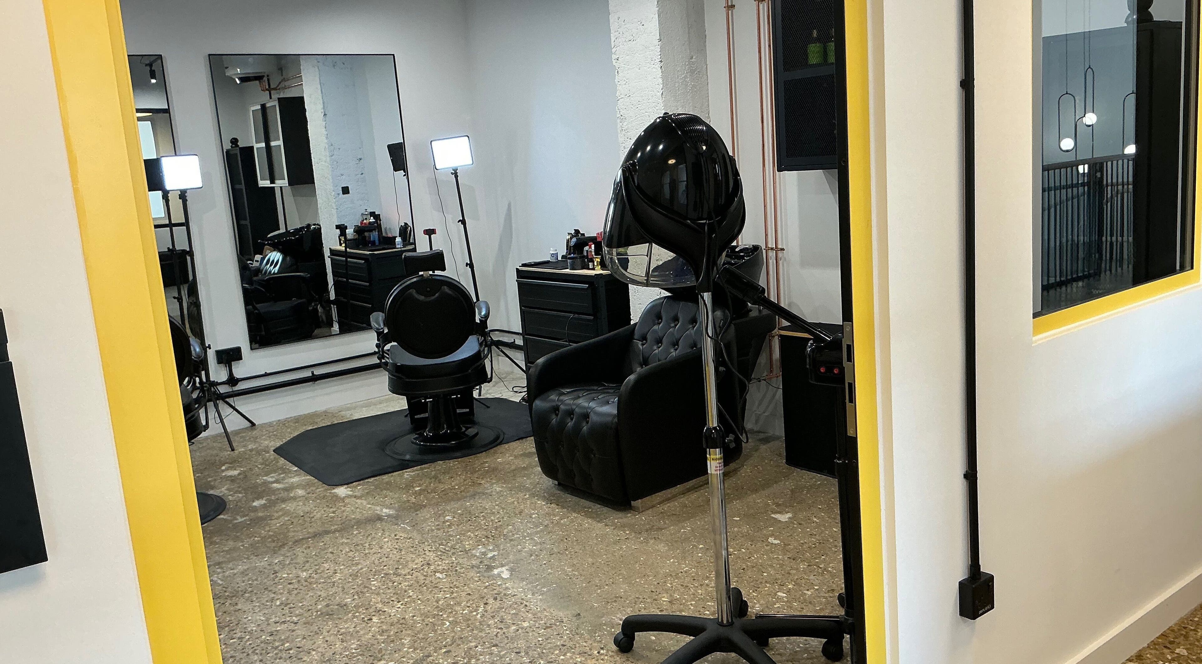 Interior view of Shanstyling salon with modern decor and chic furnishings in London, England, GB.