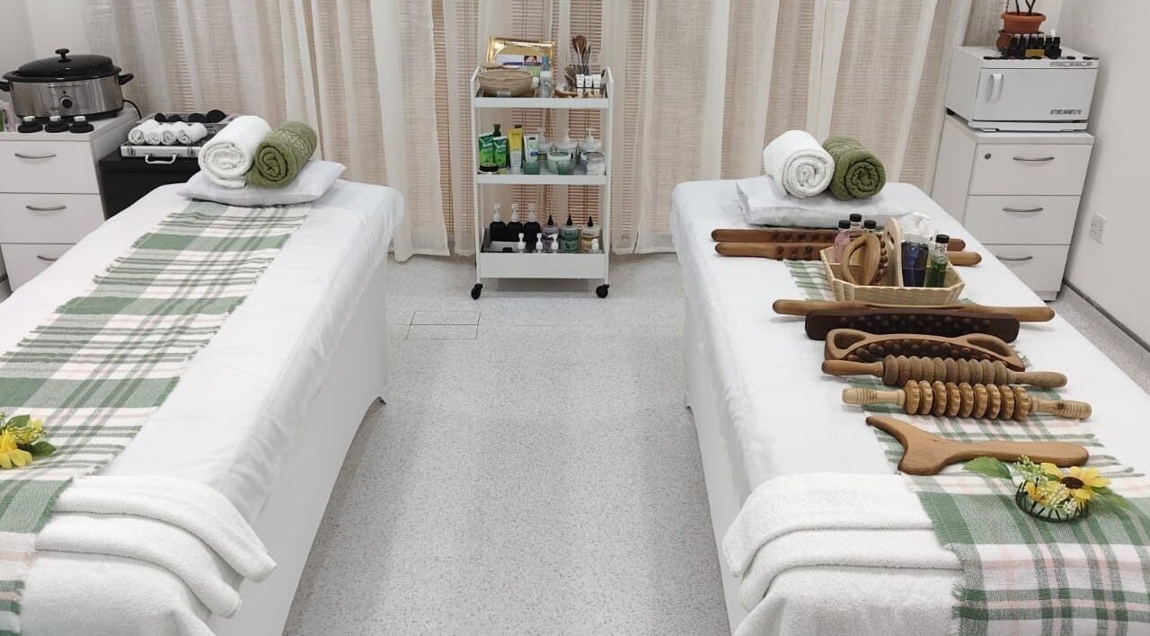 Dual massage beds at Mabuhay Island Women Massage and Relaxation Center, Abu Dhabi, AE, ready for relaxation.