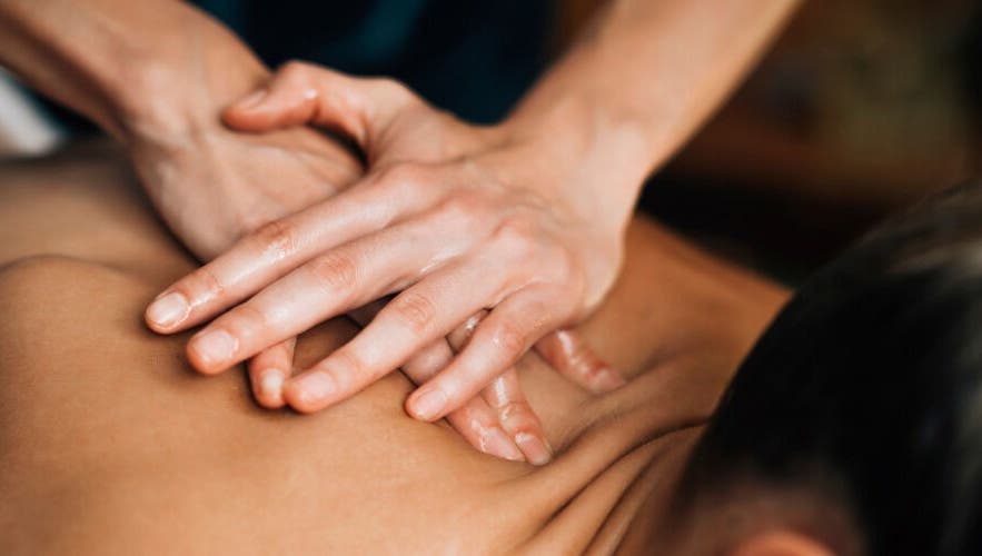 Relaxing back massage at Chokdee Thai Massage by Meaw in Perth, Scotland, GB, showcasing expert hand techniques.