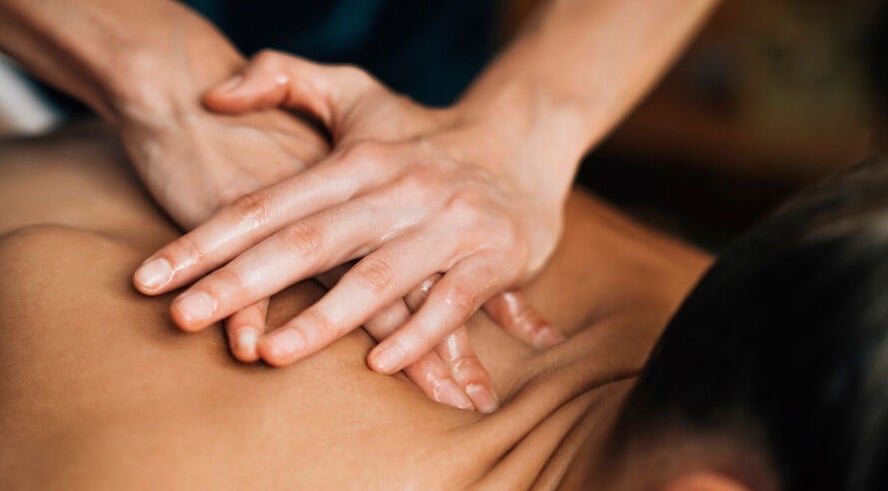 Relaxing back massage at Chokdee Thai Massage by Meaw in Perth, Scotland, GB, showcasing expert hand techniques.