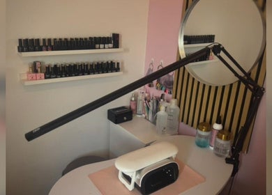 A.J Luxe nail care station with lamp and polish display in Barnsley, England, GB.
