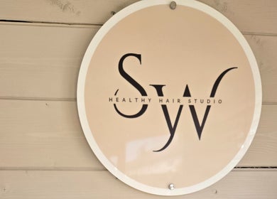 Logo sign of Healthy Hair Studio Derby, located in Derby, England, GB.