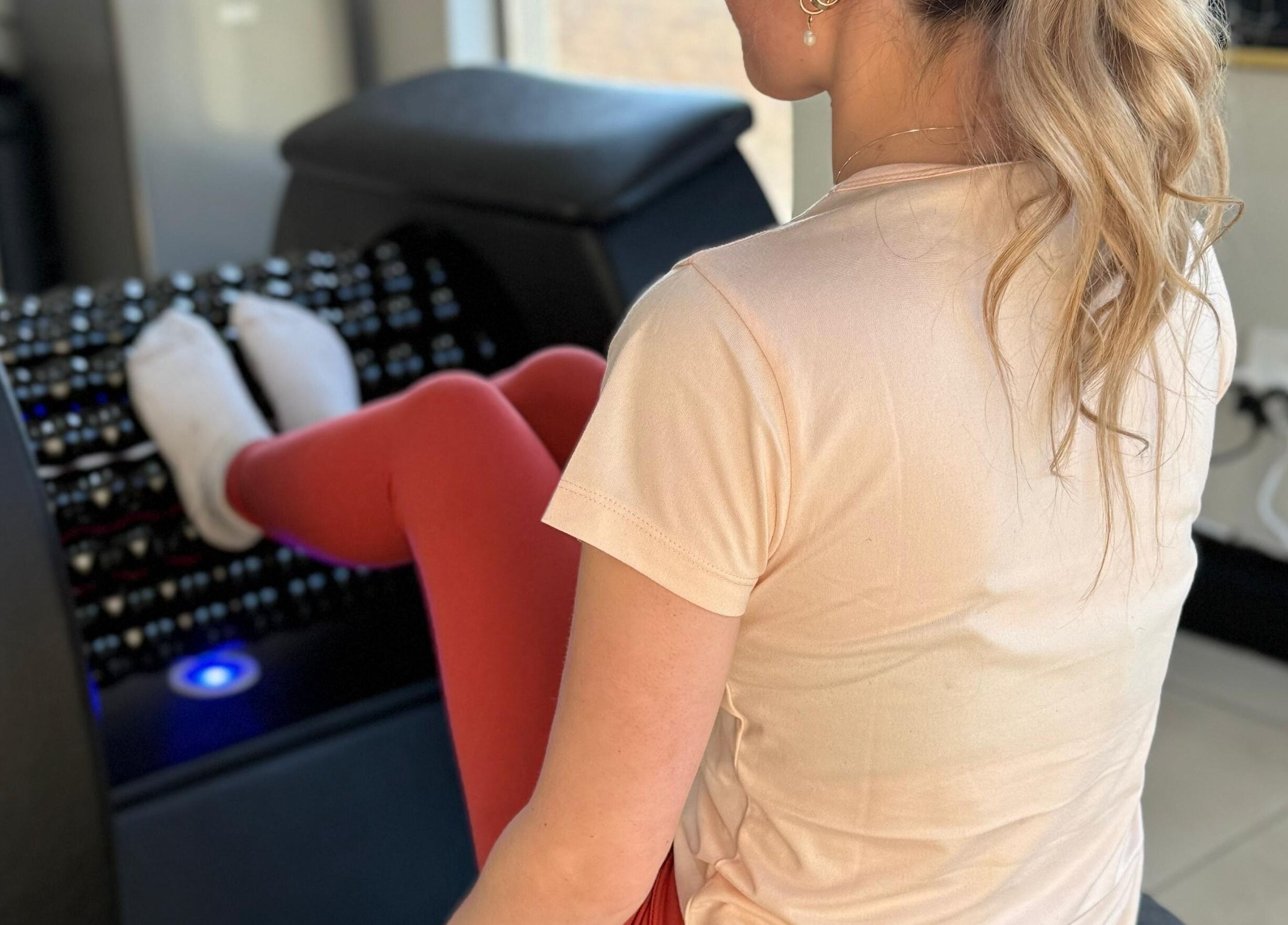Person enjoying foot massage chair at Shape And Sculpt, Pretoria, Gauteng, ZA for wellness and relaxation.