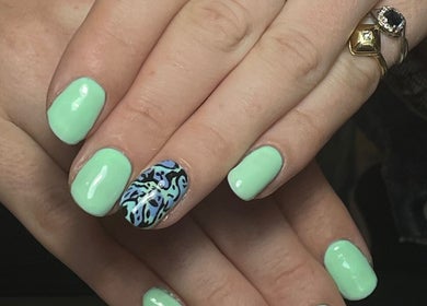 Close-up of mint and blue patterned nails by Nails by Delle, Dingwall, Scotland, GB.