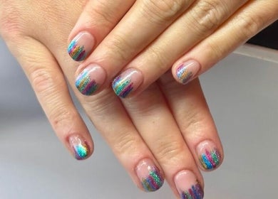 Vibrant rainbow shimmer nails created at Nails by Delle in Dingwall, Scotland, GB.
