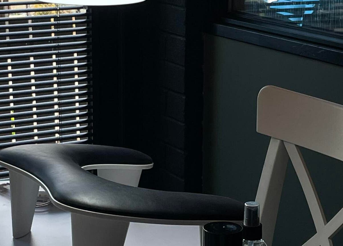 Cozy nail treatment area at Nails by Delle, Dingwall, Scotland, GB with stylish chair and window blinds.